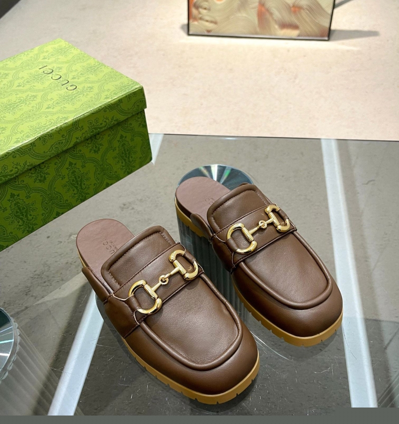 G*u*i slippers